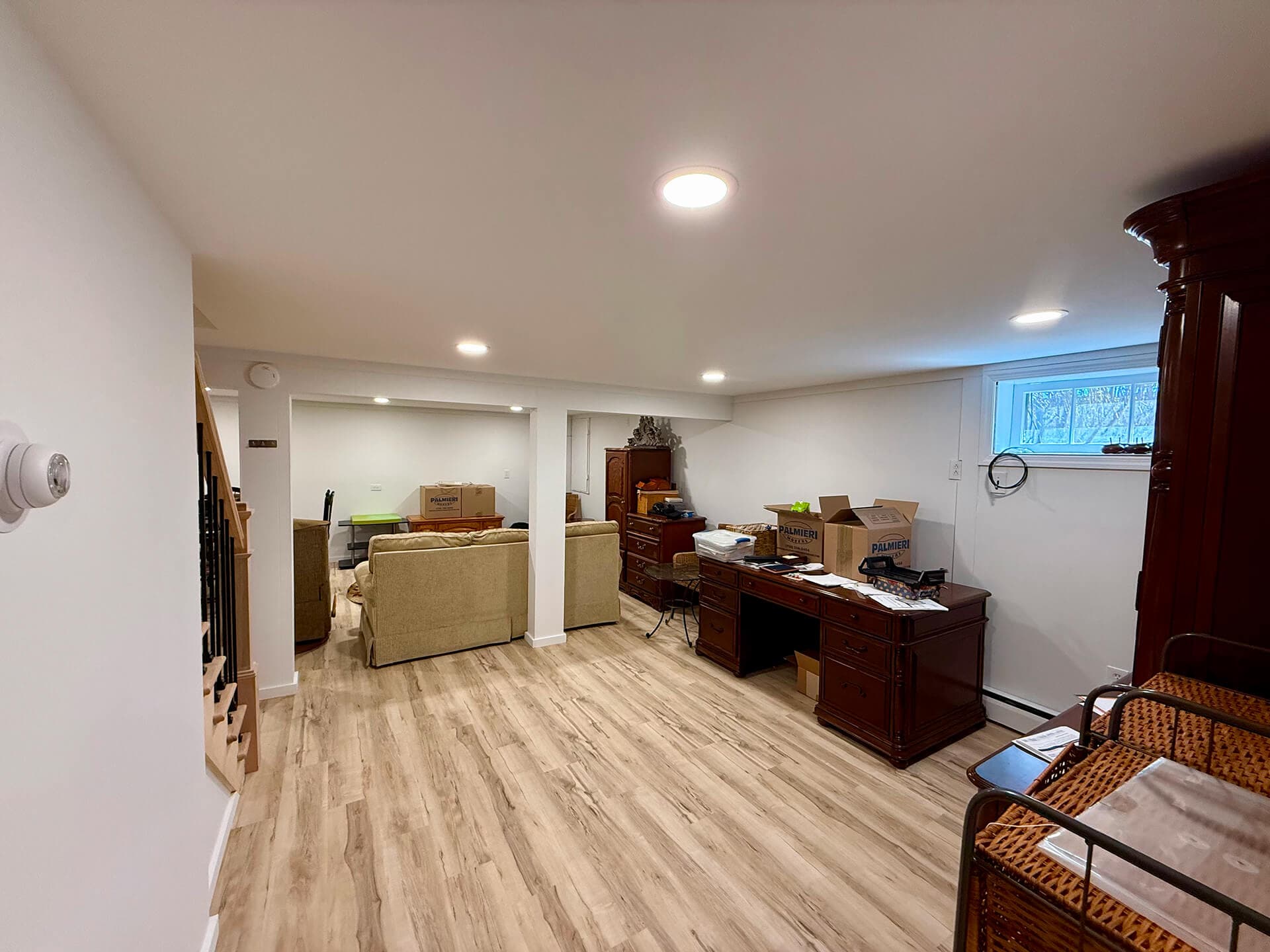 Full basement renovation- Sheetrock, prime, painted and trim work.